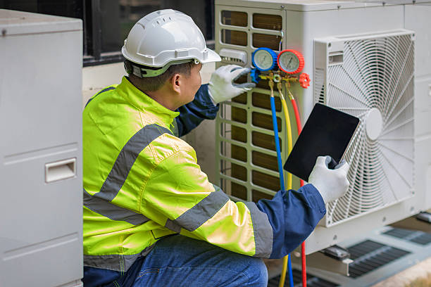 Professional Air Conditioning Repair technician working in Oakwood, PA